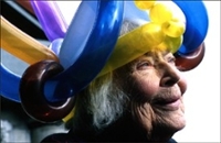Picture of Mary Holmes wearing a balloon hat